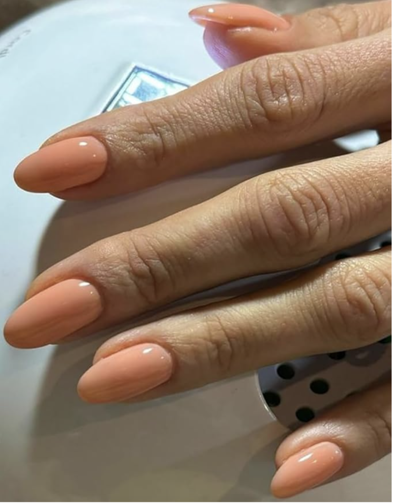 chic nail designs for fall with a pumpkin color example